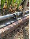 Fixation béton pour Serre de jardin.
